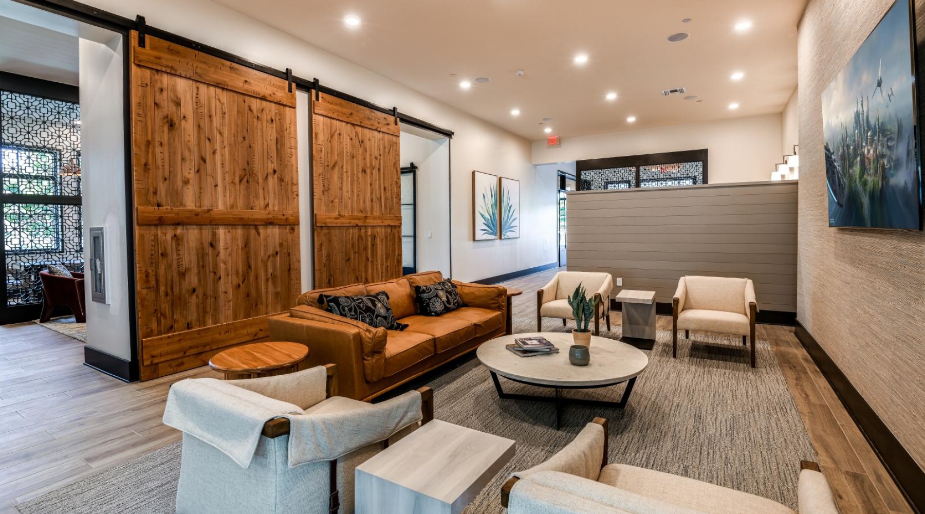 Beautiful clubroom with lounge seating and gaming areas Beautiful apartment clubroom and luxury resident lounge in Miami
