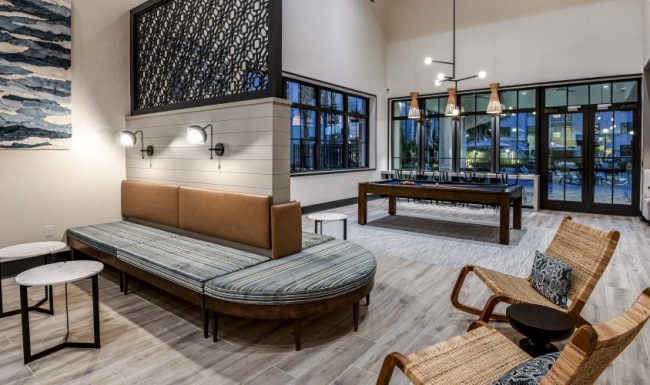 Cutting-edge amenities at your fingertips a room with a couch and chairs