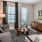 a living room with a tv and couches