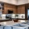 a kitchen with an island and a refrigerator