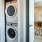 a room with a washing machine and a door