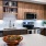 a kitchen with wooden cabinets