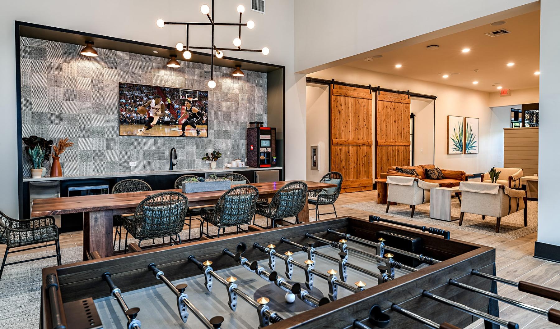 Access to resident-only features a room with tables and chairs