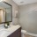 a bathroom with a large mirror